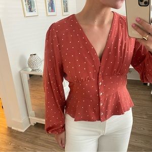 Red polka dot top with cinched waist
